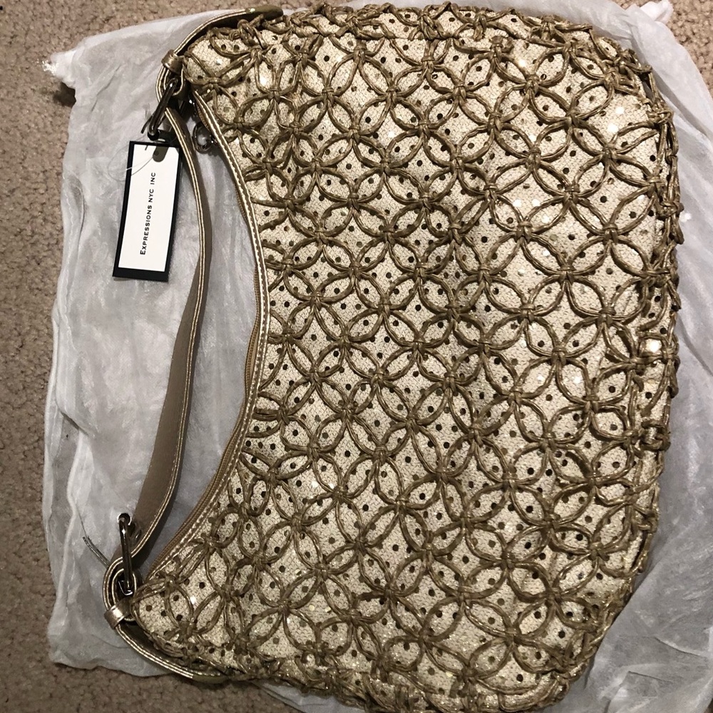 Expressions NYC Inc. handcrafted Seashell and beaded bag